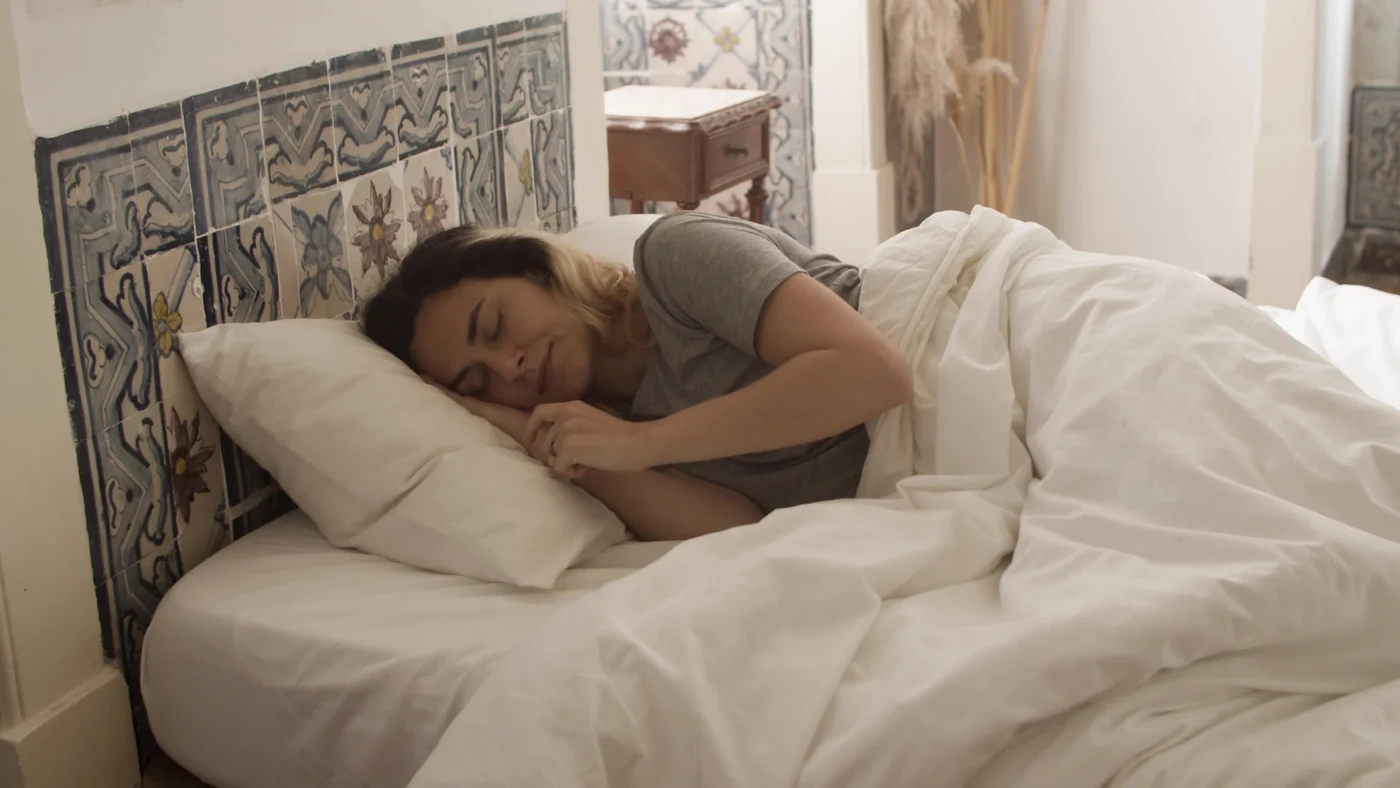 Woman resting in bed